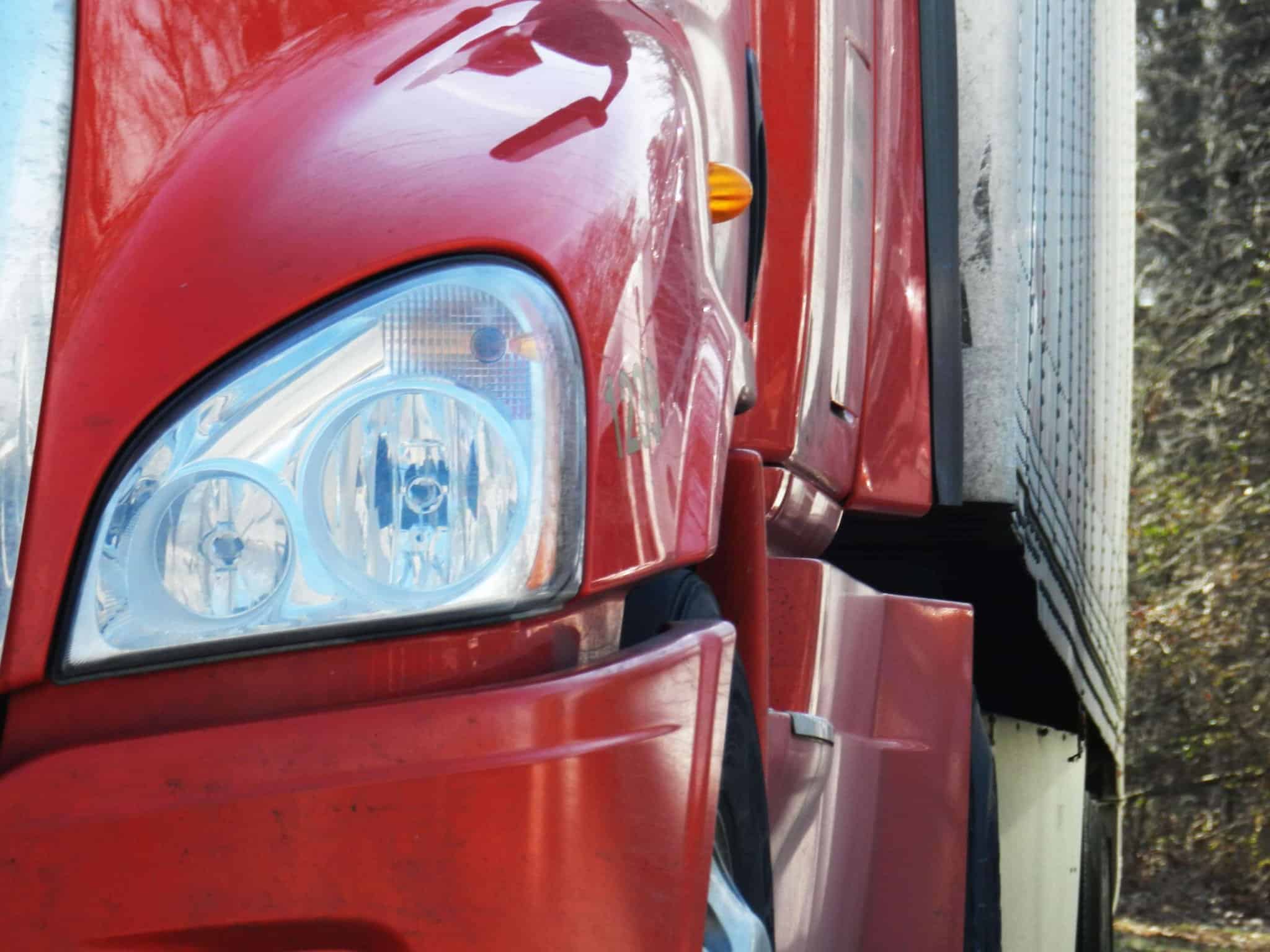 close up of the front driver's side of a semi truck, truck accident attorneys