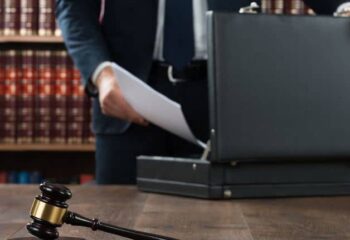 car accident injury lawyer opening a briefcase