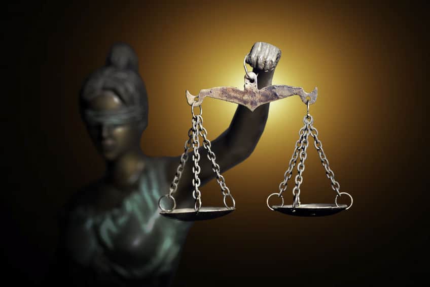 Lady Justice figure with scales highlighted