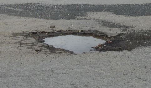 pothole with water in it