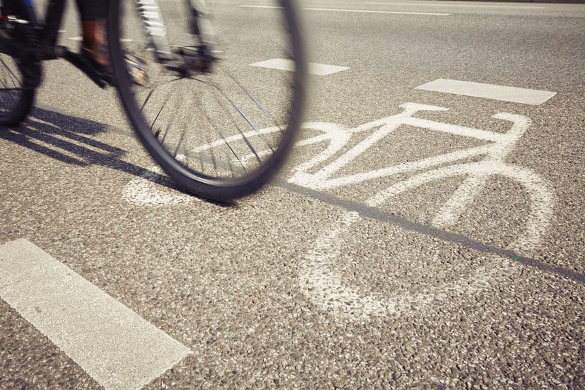 close up of a tire of a bike in the bike lane