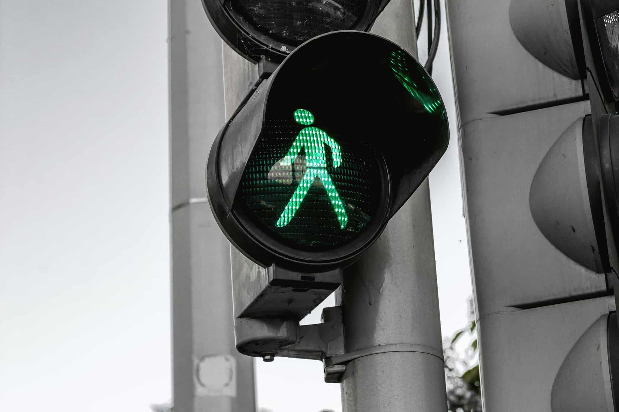 lit up walk symbol for crosswalk