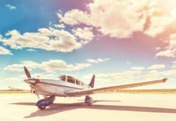 single engine airplane parked at the airport