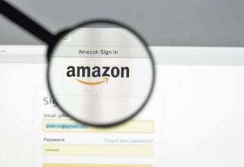 a magnifying glass over the amazon.com sign in page, magnifying the amazon logo