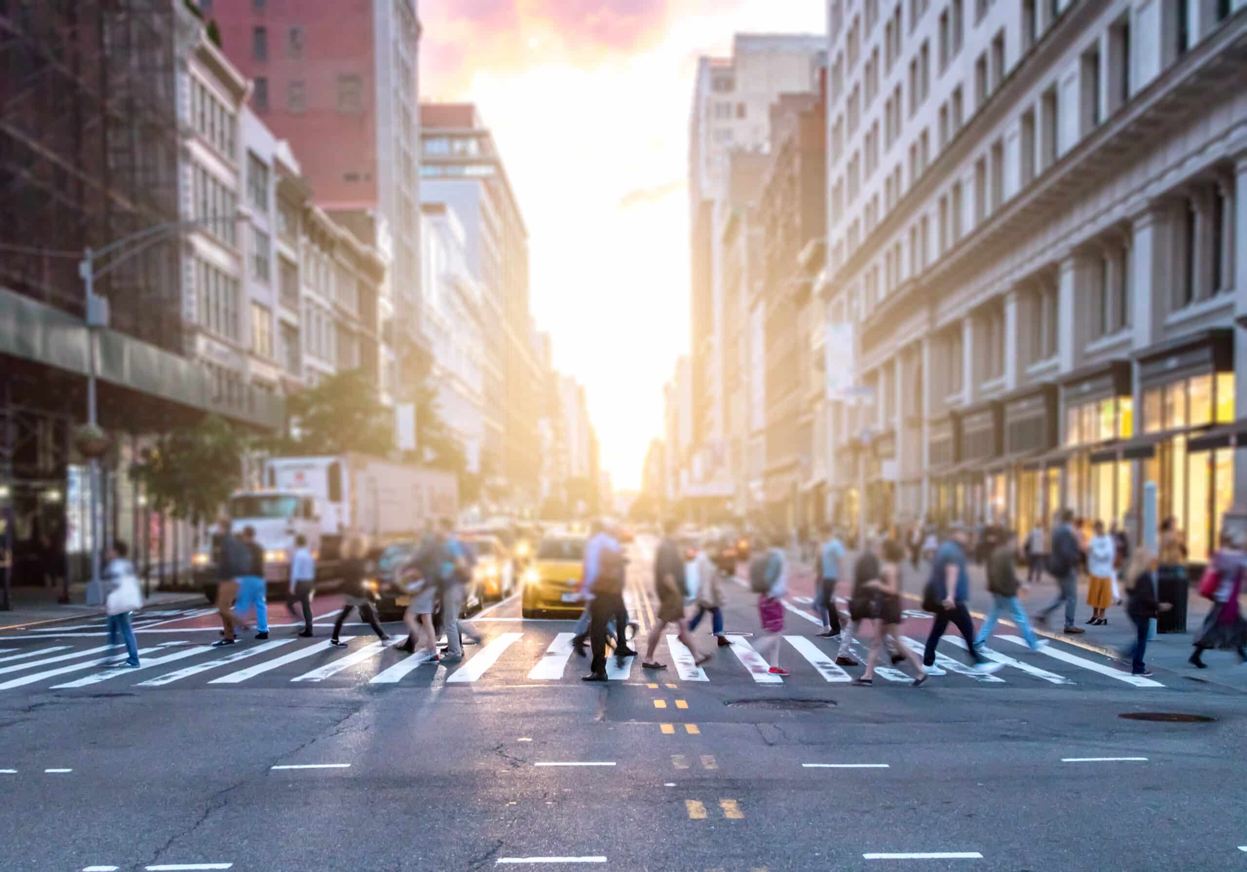 pedestrians crossing street in new york city