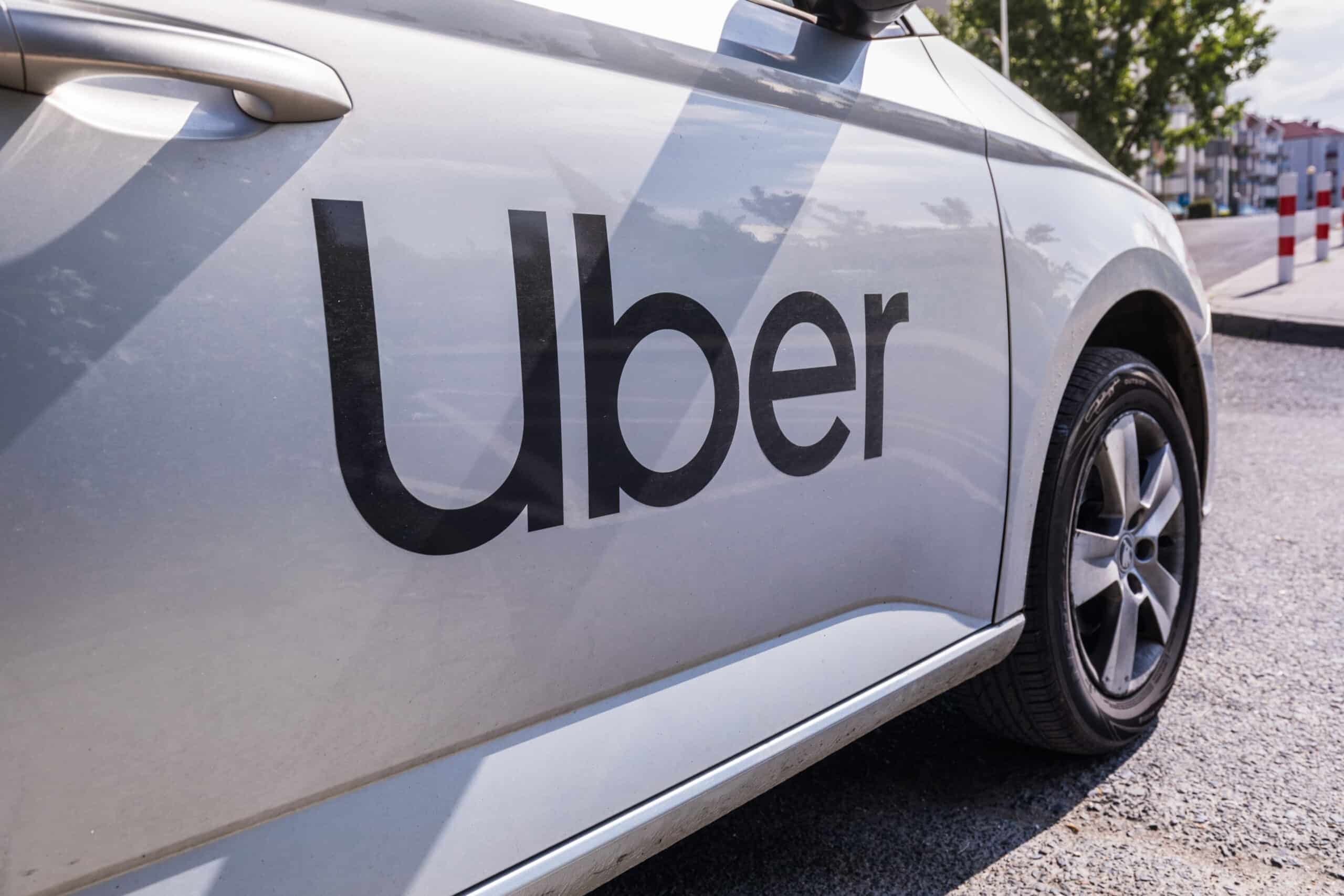 vehicle with uber logo on the side