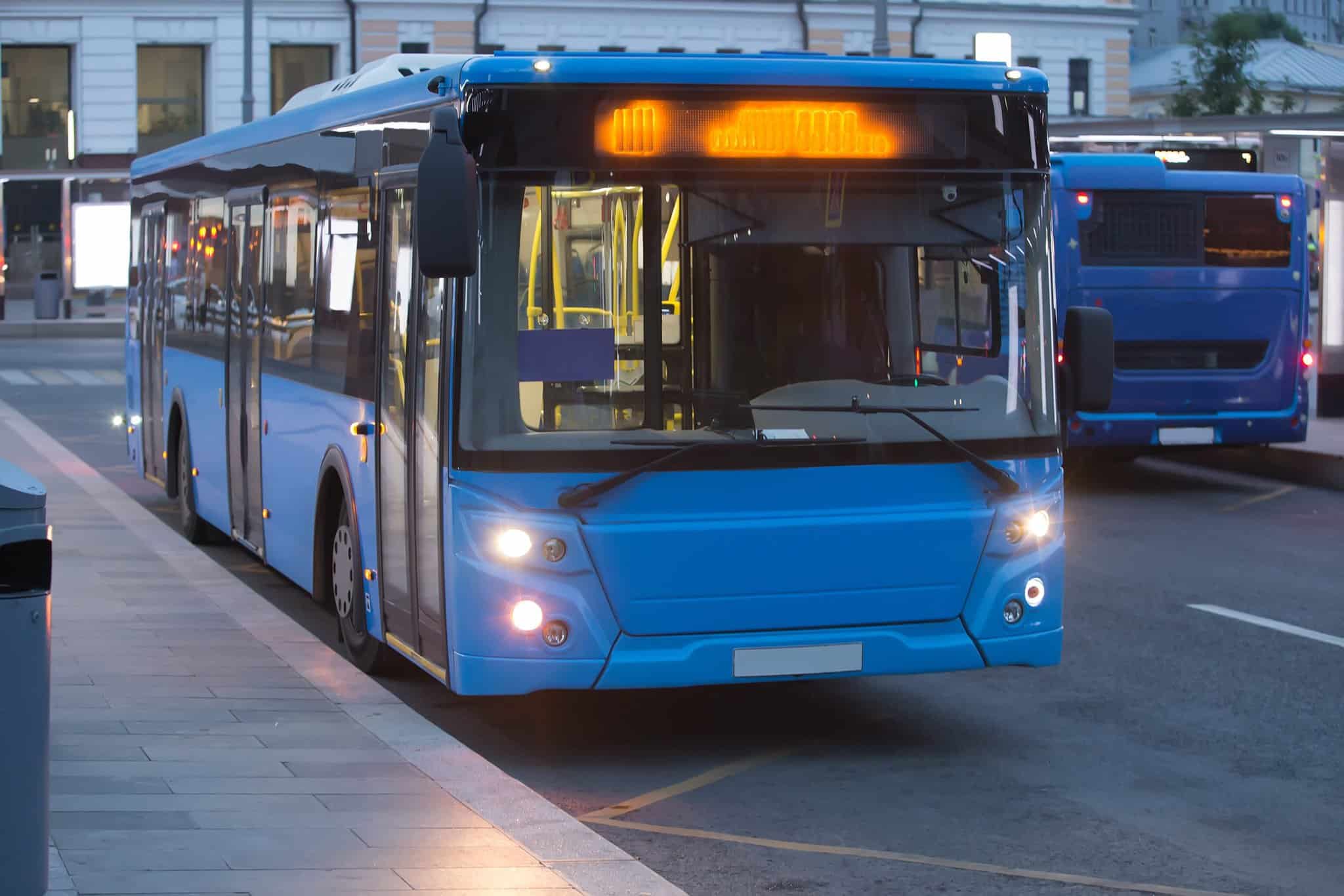 bus driving on city street