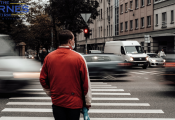 Image of a A Man Standing on the Pedestrian Crossing