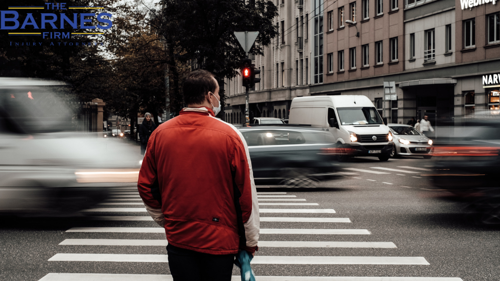 Image of a A Man Standing on the Pedestrian Crossing