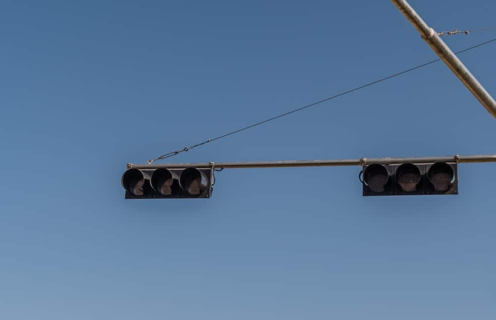 if a traffic signal light is not working, you must