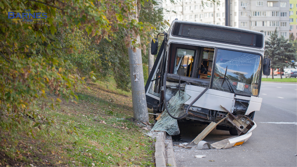 Image of a passenger city bus that bus crashed into a pole.