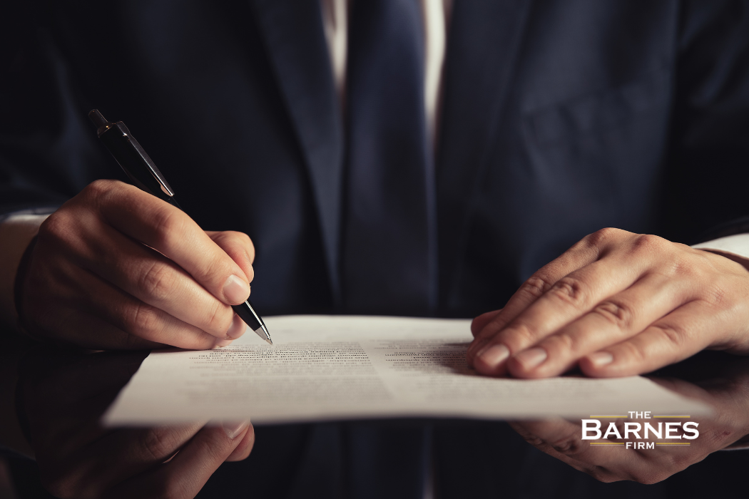 san diego car accdient lawyer writing a document