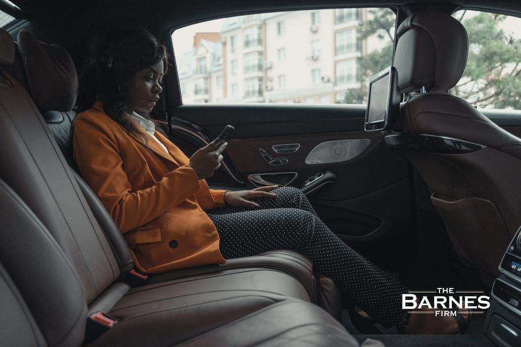 woman riding in the backseat of an Uber in Rochester